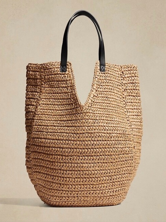 Banana Republic Handbags - Banana Republic Tan straw tote features V-shape opening vegan leather handles